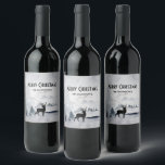 Reindeer in the Wild Grey Watercolor Christmas Wine Label<br><div class="desc">Merry Christmas bottle labels with a watercolor image featuring a black silhouette reindeer standing among some pine trees. Grey black and white neutral colour scheme.</div>