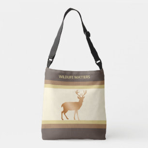 Reindeer silhouette on ivory & brown shades crossbody bag