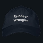 Reindeer Wrangler Elegant Navy Colour Christmas Ev Embroidered Hat<br><div class="desc">Show off your holiday spirit with this Alternative Apparel Basic Adjustable Cap in navy,  featuring the custom-embroidered "Reindeer Wrangler" text. The high-quality embroidery adds a fun and festive touch. This adjustable cap ensures a comfortable fit for all your holiday adventures.</div>