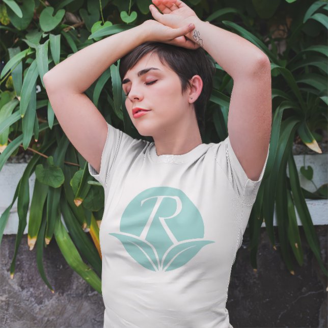 Rejuvenescents Icon- Body Care Brand Tri-Blend Shirt (Woman holding arms above her head wears a "Rejuvenescents" Logo t-shirt in Light Blue on White.)