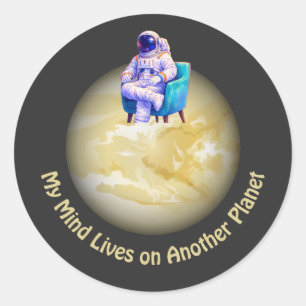 Relaxed Astronaut Sitting on Planet  Classic Round Sticker