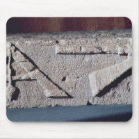 Relief depicting a stonemason's instrument