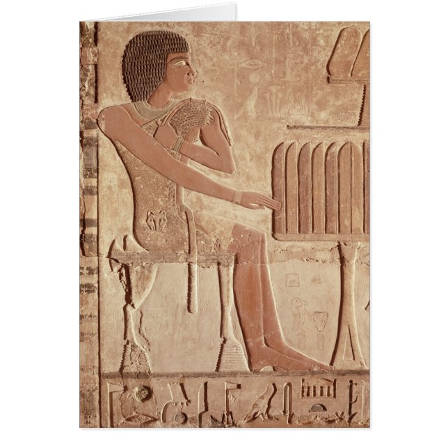 Relief depicting the deceased seated (Front)