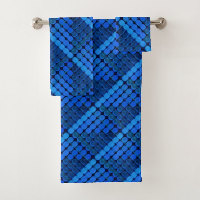 Repetition of royal blue circles forming geometric bath towel set (Insitu)