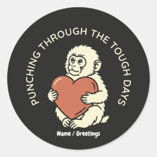 Resilient Baby Monkey & Heart Punching Through Classic Round Sticker