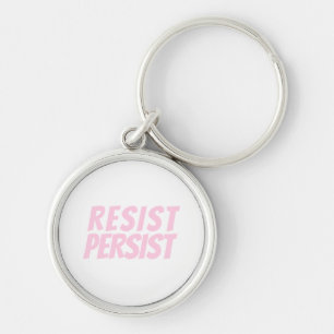 "resist persist" light pink white key ring