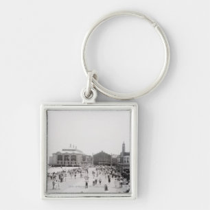 Resort tourists on esplanade key ring
