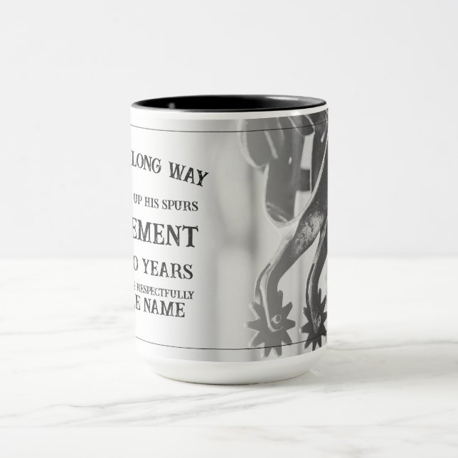 Retirement announcement with old spurs mug (Center)