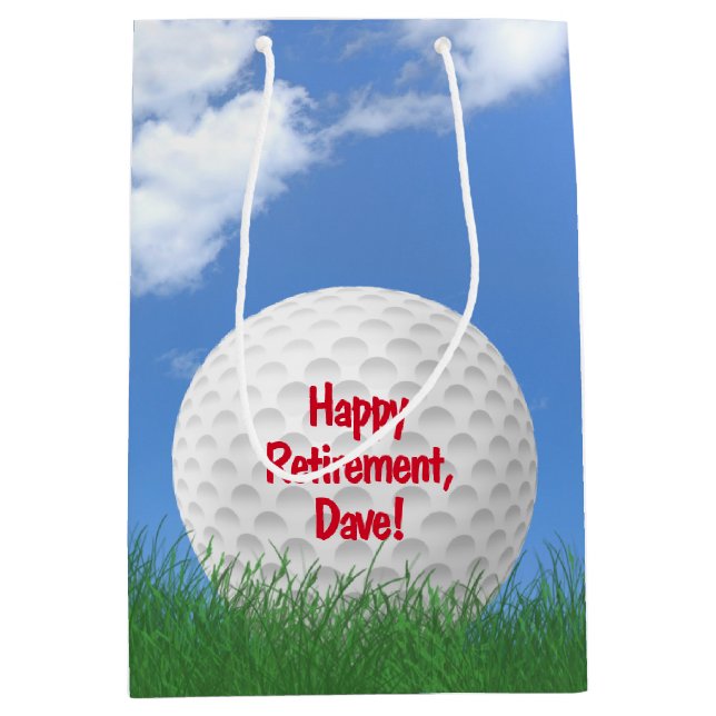 Retirement golf ball in grass with name medium gift bag (Front)