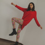 Retro 1970s Collage of Christmas Words Patterned Leggings<br><div class="desc">Add a vintage touch to your Christmas look this year with these retro style leggings. They feature a collage of Christmas greetings and sayings in a seventies style colour palette of pink, orange, red, green and lime green.</div>