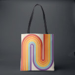 Retro 1970s Style Arched Stripes Geometric Pattern Tote Bag<br><div class="desc">This artwork channels a retro graphic spirit, forming the letter‑like curve with parallel bands of red, orange, yellow, light blue, teal, and purple. The layered arcs flow in harmony, evoking the bold optimism of 1970s design. Set against a soft beige background, the vibrant rainbow palette stands out with clarity and...</div>