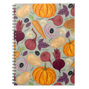 Retro background from fresh vegetables spiral notebook