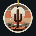 Retro Boho Saguaro Cactus Desert Sunset Ornament<br><div class="desc">Bring the warmth of the Southwest to your holiday decor with this stylish Mid-Century Modern cactus ornament. Featuring a minimalist Saguaro silhouette against a vibrant, striped desert sunset, this design blends vintage 70s vibes with contemporary boho flair. Perfect for desert lovers, nature enthusiasts, or anyone looking to add a unique,...</div>
