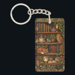 Retro book lover woodland animals key ring<br><div class="desc">A cozy retro-inspired design featuring a charming bookshelf filled with vintage books,  delicate botanical accents,  cute woodland animals and a comforting cup of tea or coffee.</div>