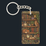 Retro book lover woodland animals key ring<br><div class="desc">A cozy retro-inspired design featuring a charming bookshelf filled with vintage books,  delicate botanical accents,  cute woodland animals and a comforting cup of tea or coffee.</div>