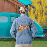Retro Bride Typography Summer Rainbow Wedding T-Sh Denim Jacket<br><div class="desc">Elevate your wedding day style with our Groovy Bride Denim Jacket. This unique jacket showcases a retro-inspired rainbow design paired with 70's typography, creating a playful and boho aesthetic. The colour scheme features terracotta, orange, mustard-yellow, and beige, giving it a distinctive and groovy vibe. Whether you're a free spirit or...</div>