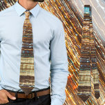 Retro cosmic tie<br><div class="desc">Experience the allure of shimmering lights and festive vibes with our artistic neck tie. Crafted with a remarkable abstract pattern in vintage brown and yellow hues, this accessory adds a touch of elegance to any occasion. Embrace the holiday season in style and effortlessly showcase your unique fashion sense.</div>