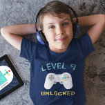 Retro Gamer Theme Kids Birthday Party T-Shirt<br><div class="desc">The perfect match to your child's video game themed birthday party,  this cool retro kids birthday shirt features a video game controller with "Level [Age] Unlocked" in vintage digital style lettering.</div>
