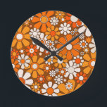 Retro Garden Floral 60s 70s Pattern Brown & Orange Round Clock<br><div class="desc">Retro Garden Groovy Floral Cheerful 60s 70s Pattern in 1970s Orange Brown Beige. Upbeat,  vivid,  vintage aesthetic flowers with a 1960s 1970s hippie flower power vibe. By Kierkegaard Design Studio.</div>