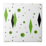 Retro Green Diamonds & Starbursts Ceramic Tile<br><div class="desc">This customisable Retro Green Diamonds and Starbursts Ceramic Tile is a new take on a vintage style. It features kitschy, black starbursts on green polka dots, surrounding geometric, green and black diamond shapes. Customise the background colour on this mid century modern product if you're feeling daring, or leave it white...</div>