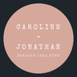 Retro Minimalist Dusty Rose Typewriter Wedding Classic Round Sticker<br><div class="desc">Add a vintage charm to your wedding favours with this Retro Minimalist Typewriter Font Custom Wedding Classic Round Sticker! The soft dusty rose background beautifully complements the simple white typography in a classic typewriter font, creating a timeless and elegant design. Perfect for sealing envelopes, decorating favours, or adding a personal...</div>