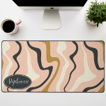 Retro Modern Abstract Marble Swirl Pink Gold Black Desk Mat<br><div class="desc">Immerse yourself in a dance of colours with our Abstract Retro Modern Liquid Marble Wave Pattern. Evoking the dynamic fluidity of marbled surfaces and the charming aesthetics of retro-modern design, this pattern is a feast for the eyes. A symphony of vibrant colours swirls and flows in wave-like motions, creating a...</div>