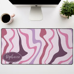 Retro Modern Abstract Marble Swirl Purple Mauve Desk Mat<br><div class="desc">Immerse yourself in a dance of colours with our Abstract Retro Modern Liquid Marble Wave Pattern. Evoking the dynamic fluidity of marbled surfaces and the charming aesthetics of retro-modern design, this pattern is a feast for the eyes. A symphony of vibrant colours swirls and flows in wave-like motions, creating a...</div>