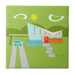 Retro Palm Springs House Ceramic Tile<br><div class="desc">This Retro Palm Springs House with Car Ceramic Tile is a mid century modern lover’s dream. The minimalist art design features a sleek orange and glass house with a dramatically sloping checkmark shape roof. The red door offsets the orange stone planter filled with greenery and the decorative turquoise cinderblock privacy...</div>
