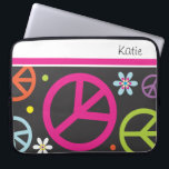 Retro Peace Sign  |   Laptop Sleeves<br><div class="desc">Retro peace signs in orange,  green,  pink blue and purple on a black background make this laptop sleeve a cool accessory to have .. perfect gift idea for woman or tweenw and teens.</div>