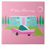 Retro Pink Palm Springs Ceramic Tile<br><div class="desc">Between the pink background, turquoise mid century modern home, and the classic 1950s car, this design couldn’t be more Palm Springs if it said it in the clouds. Oh, wait, it does say it in the clouds! The blue and teal stone of the house is offset by the sputnik light...</div>