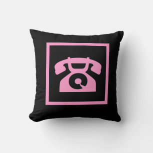 retro  pink phone on black pillow