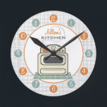 Retro Stove Personalised Kitchen Clock<br><div class="desc">A clock featuring an illustration of a retro beige kitchen stove.  Personalise with your name about illustration.  Clock features white numbers on orange and blue dots.</div>
