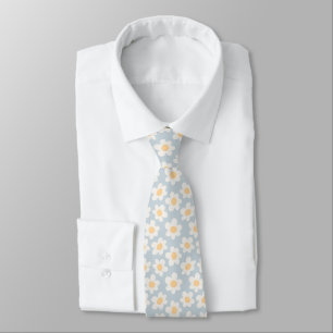 Retro style daisies in bloom on blue background tie