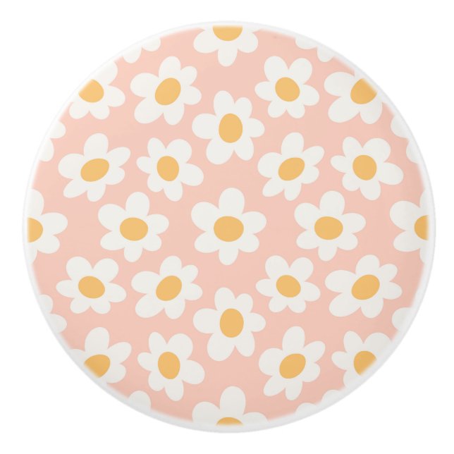 Retro style daisies in bloom on pink background ceramic knob (Front)