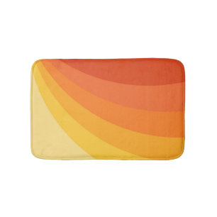 Retro style yellow and orange sun rays design bath mat