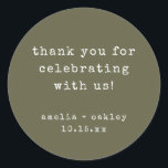 Retro Typewriter Olive Custom Wedding Thank You Classic Round Sticker<br><div class="desc">This wedding thank you sticker features an earthy olive green background with typewriter-style typography for a clean, modern look. The round format is ideal for sealing envelopes, favor bags, boxes, or wrapping paper. Names and date can be personalized to match your wedding details. A simple, timeless finishing touch for modern...</div>