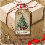 Retro Vintage  Christmas Tree Merry Christmas Gift Tags<br><div class="desc">Beautiful retro vintage illustration of a festive and decorated Christmas tree with gifts on a retro grunge background and frame for an aged or vintage look. Design features a vintage scroll ribbon for your personalisation both in the front or the back sides of this elegant, and timeless Holiday Gift Tag....</div>