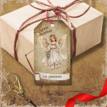 Retro Vintage Guardian Angel  Merry Christmas Gift Tags<br><div class="desc">Beautiful retro vintage illustration of a guardian angel on a retro grunge background and frame for an aged or vintage look. Design features a vintage scroll ribbon for your personalisation both in the front or the back sides of this elegant,  and timeless Holiday Gift Tag.</div>