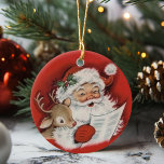 Retro Vintage Santa With Baby Rudolf Christmas<br><div class="desc">This mid-century vintage Christmas ornament features a jolly Santa Claus looking over his list as a baby Rudolf looks on.</div>