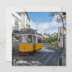 Retro yellow tram on street in Lisbon, Portugal