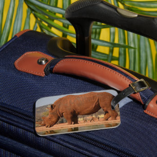 Rhino with mud on skin photo luggage tag
