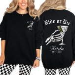 Ride Or Die Til Death Do We Party Bachelorette Sweatshirt<br><div class="desc">Celebrate your wild side with the Ride Or Die Til Death Do We Party Bachelorette Crewneck Sweatshirt, the ultimate choice for a gothic bachelorette bash. Featuring a bold skeleton hand holding a martini glass, this personalised bridesmaid sweatshirt perfectly blends spooky vibes with playful elegance. Whether you're the bride-to-be or part...</div>
