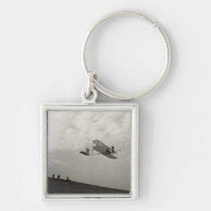 Right front view of glider in flight keychain