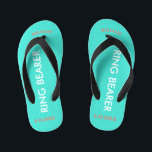 Ring Bearer NAME Turquoise Blue Kid's Jandals<br><div class="desc">Ring Bearer is written in white text against bright happy turquoise blue colour with black accents. Name and Date of Wedding is in coral text. Personalise your little ring bear boy's name in arched uppercase letters. Click Customise to increase or decrease name size to fall within safe lines. Fun beach...</div>
