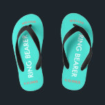 Ring Bearer NAME Turquoise Blue Kid's Jandals<br><div class="desc">Ring Bearer is written in white text against bright happy turquoise blue colour with black accents. Name and Date of Wedding is in coral text. Personalise your little ring bear boy's name in arched uppercase letters. Click Customise to increase or decrease name size to fall within safe lines. Fun beach...</div>
