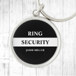 Ring Security Ring Bearer<br><div class="desc">Make your ring bearer feel like a secret agent with this stylish black and white "Ring Security" keychain. The design features a sleek, agent style design that is sure to impress. Perfect for weddings, this button adds a fun and unique touch to your special day. With its trendy and stylish...</div>