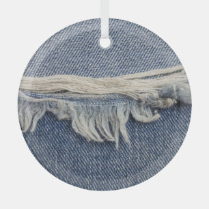 Ripped jeans texture, stylish background. glass tree decoration