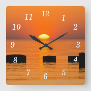 Rising Orange Wall Clock