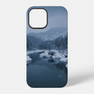 RIVER SURROUNDED BY SNOW COVERED FIELD WITH PINE T iPhone 12 CASE