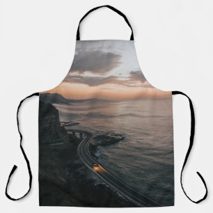ROAD BESIDE BODY OF WATER APRON